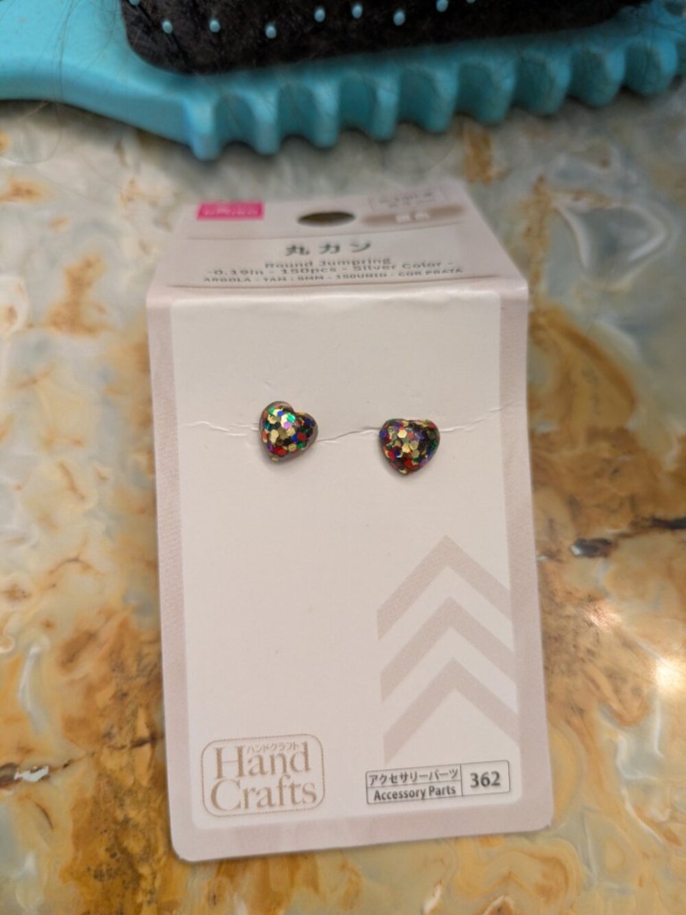 Multicolored heart shaped glitter earrings studs